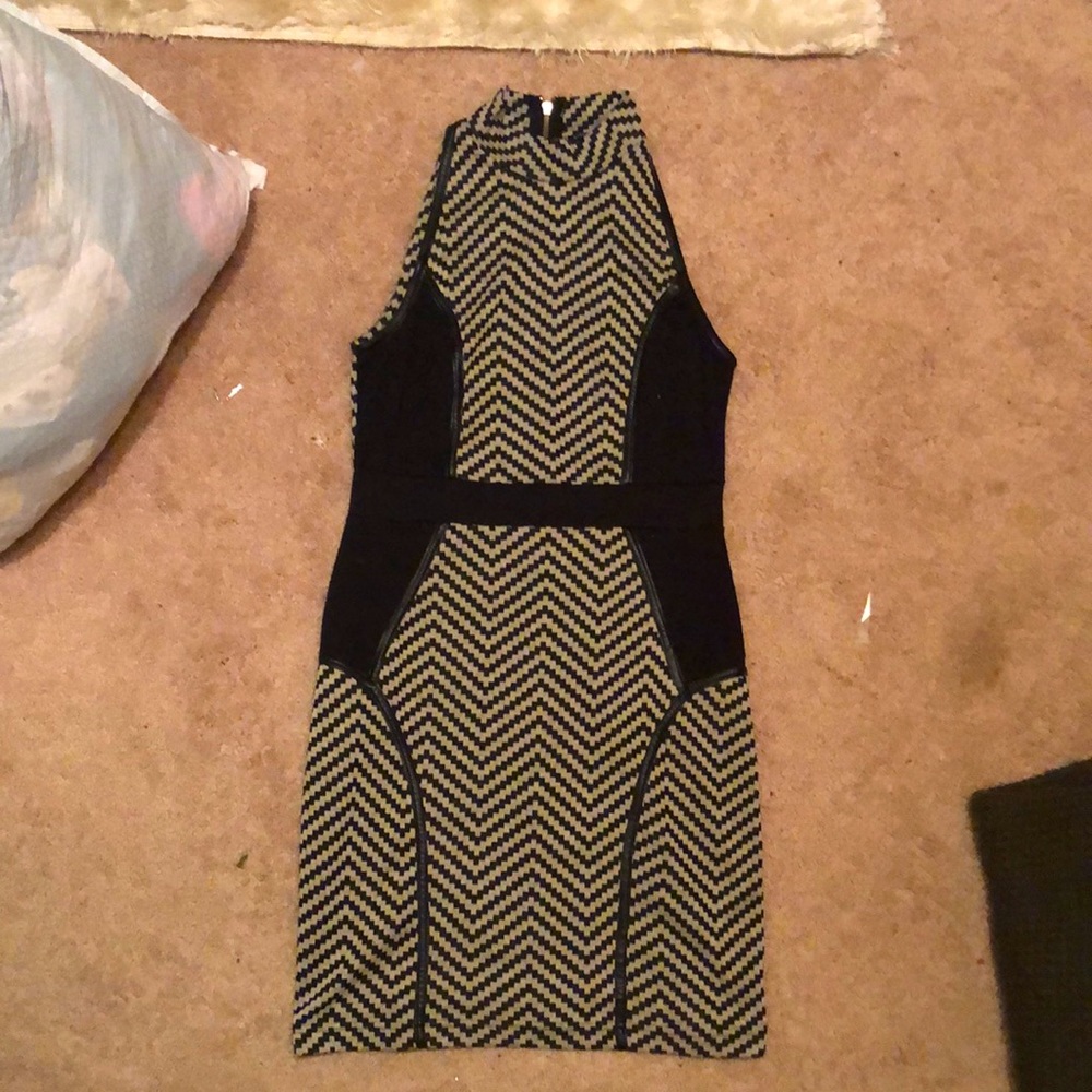 Tan and black zigzag pattern dress.
